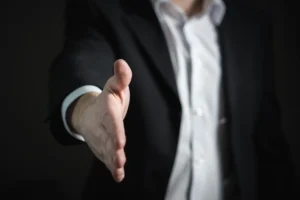 Professional handshake during a digital marketing job interview